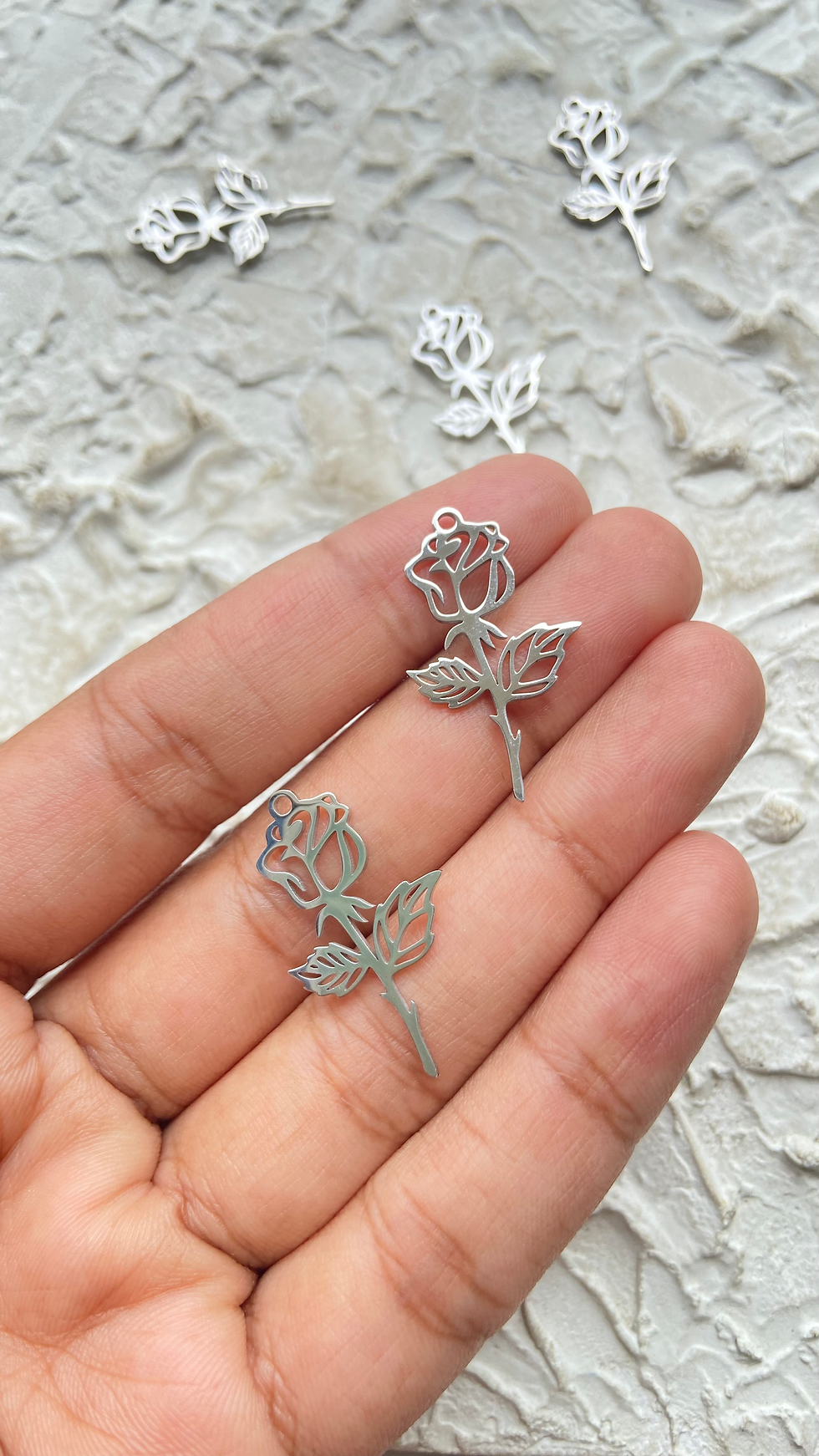 Thumbnail: Stainless steel rose with stem pendant