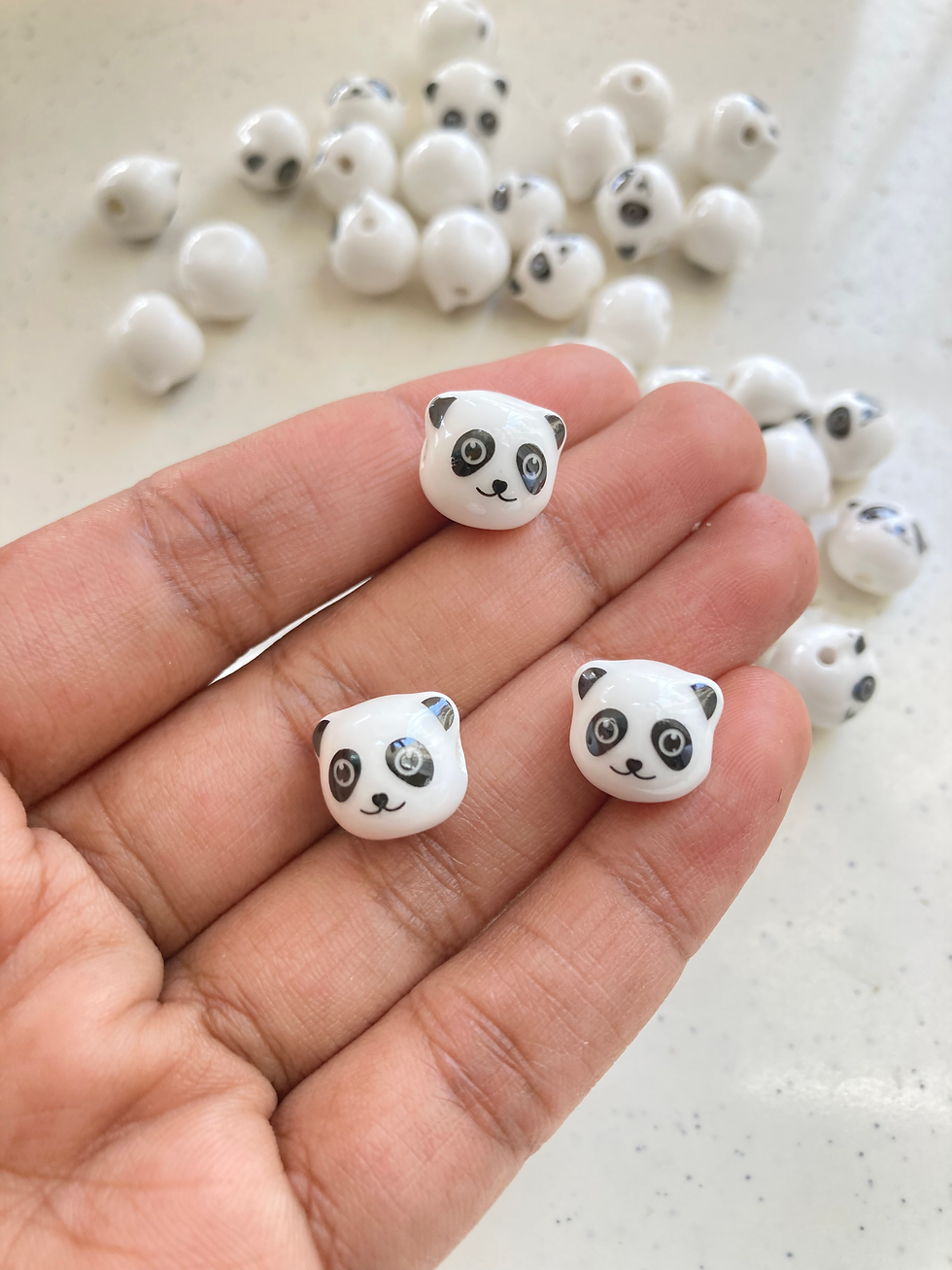 Thumbnail: Porcelain panda face side drilled bead