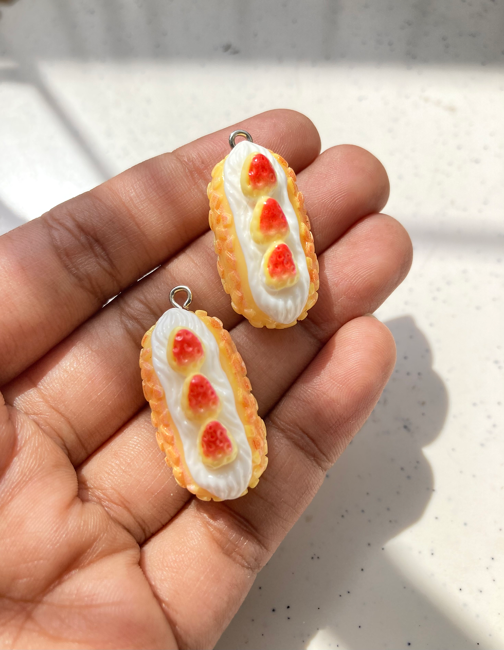 Thumbnail: Cake roll resin charm