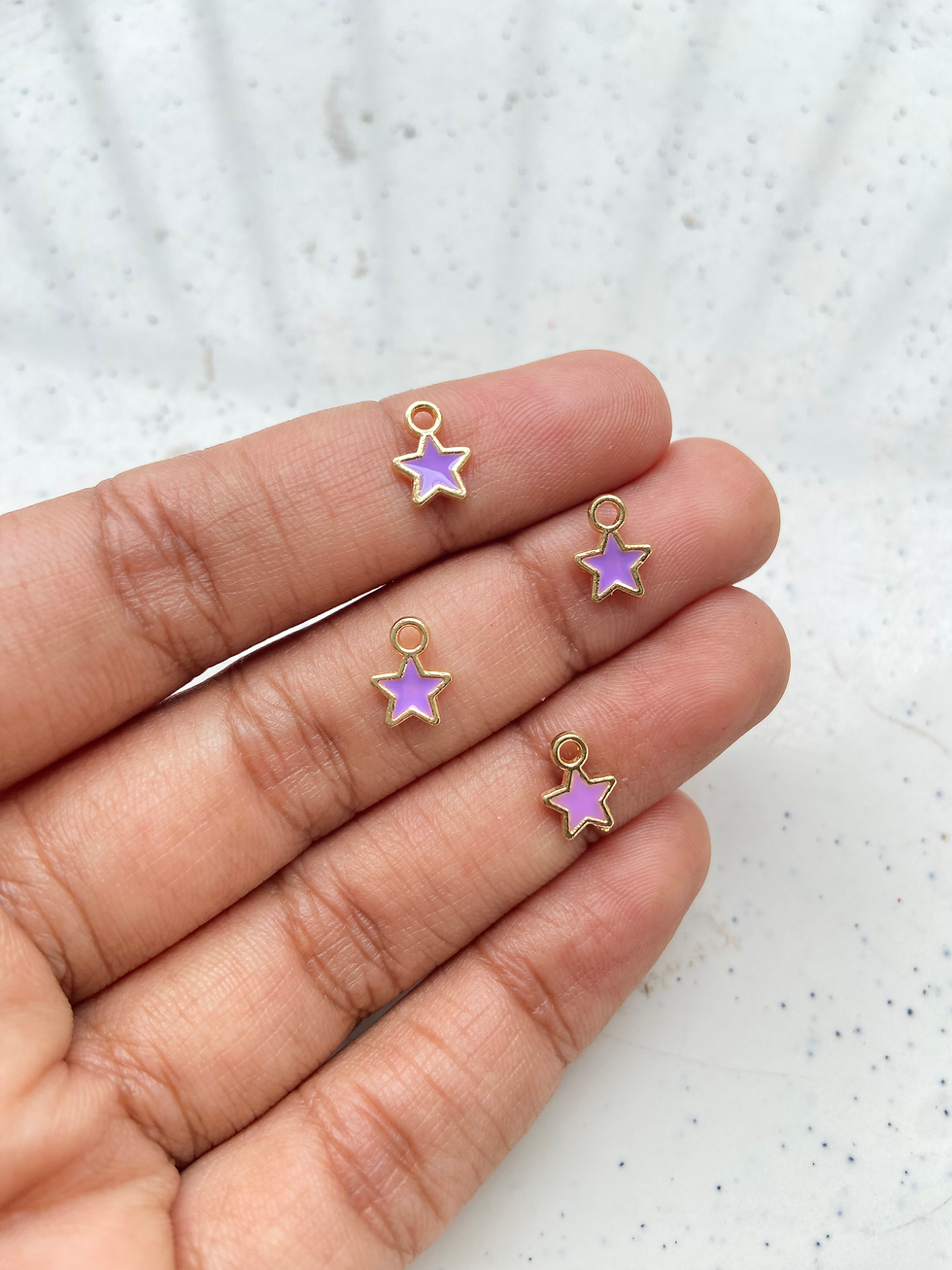Thumbnail: Tiny enamel star alloy charm