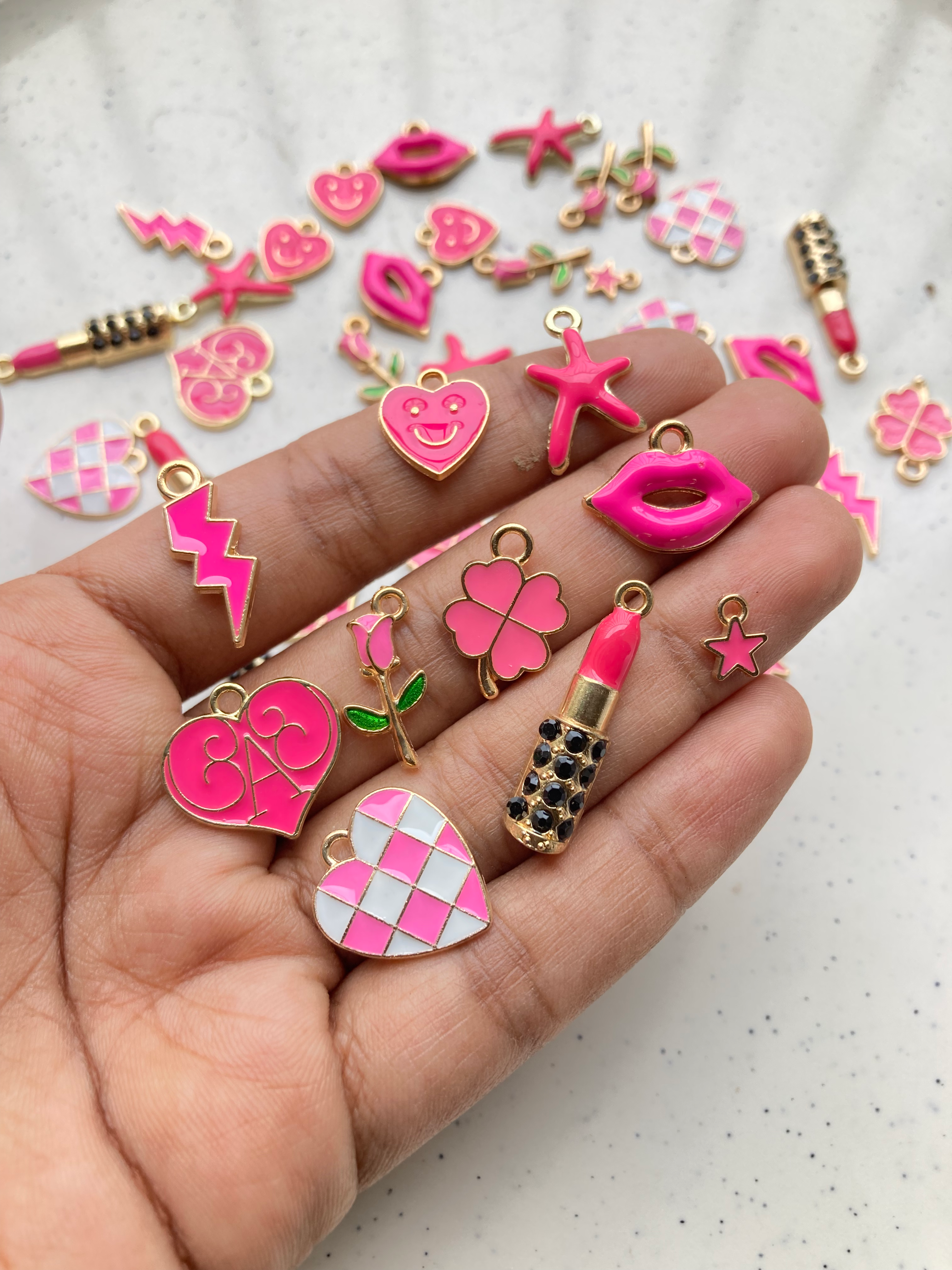 Shades of pink enamel alloy charm soup