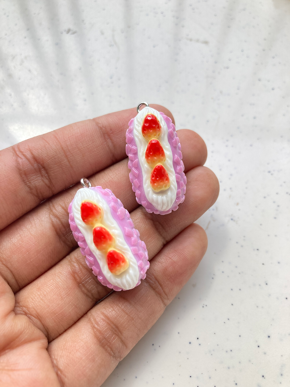 Thumbnail: Cake roll resin charm