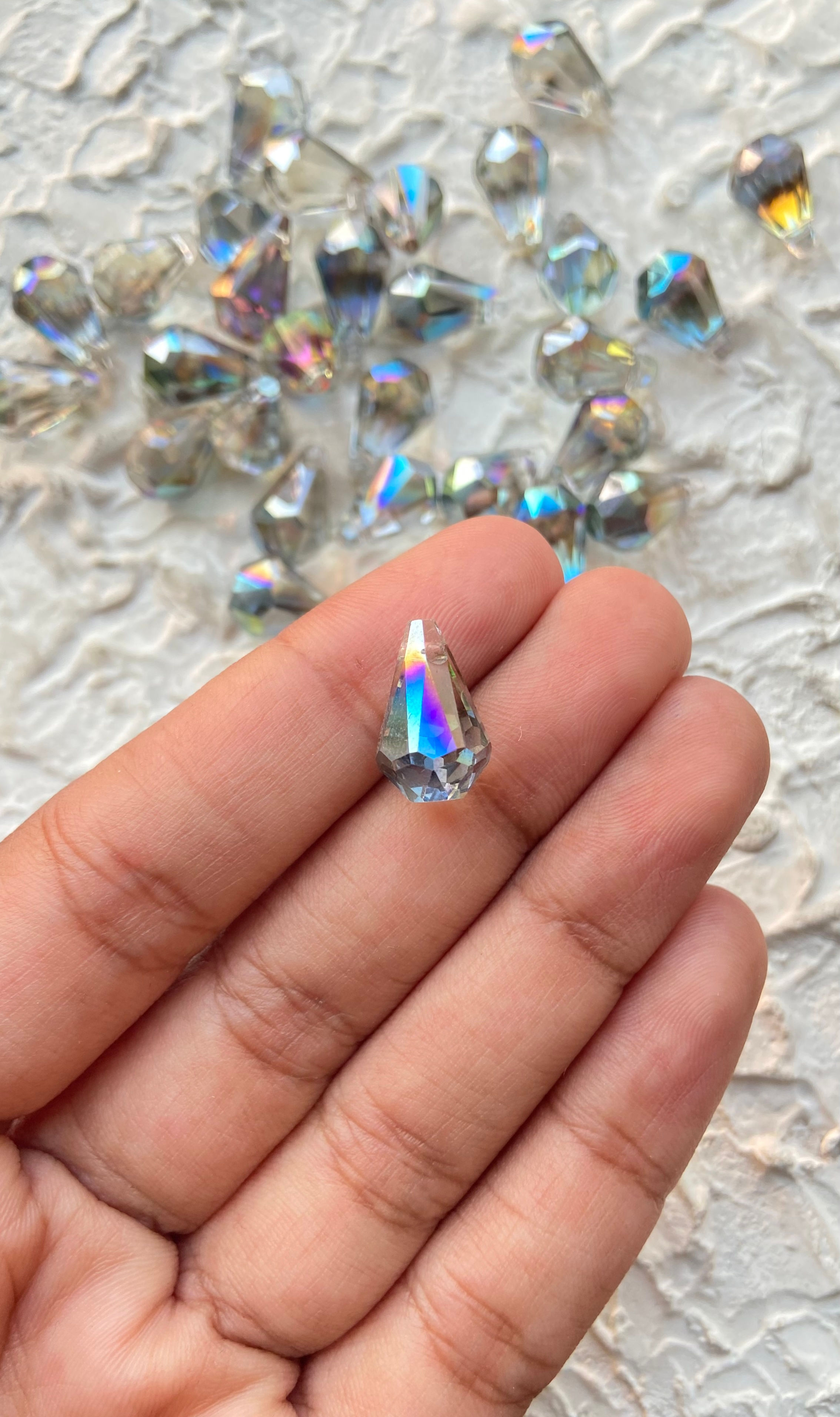faceted drop grey rainbow effect