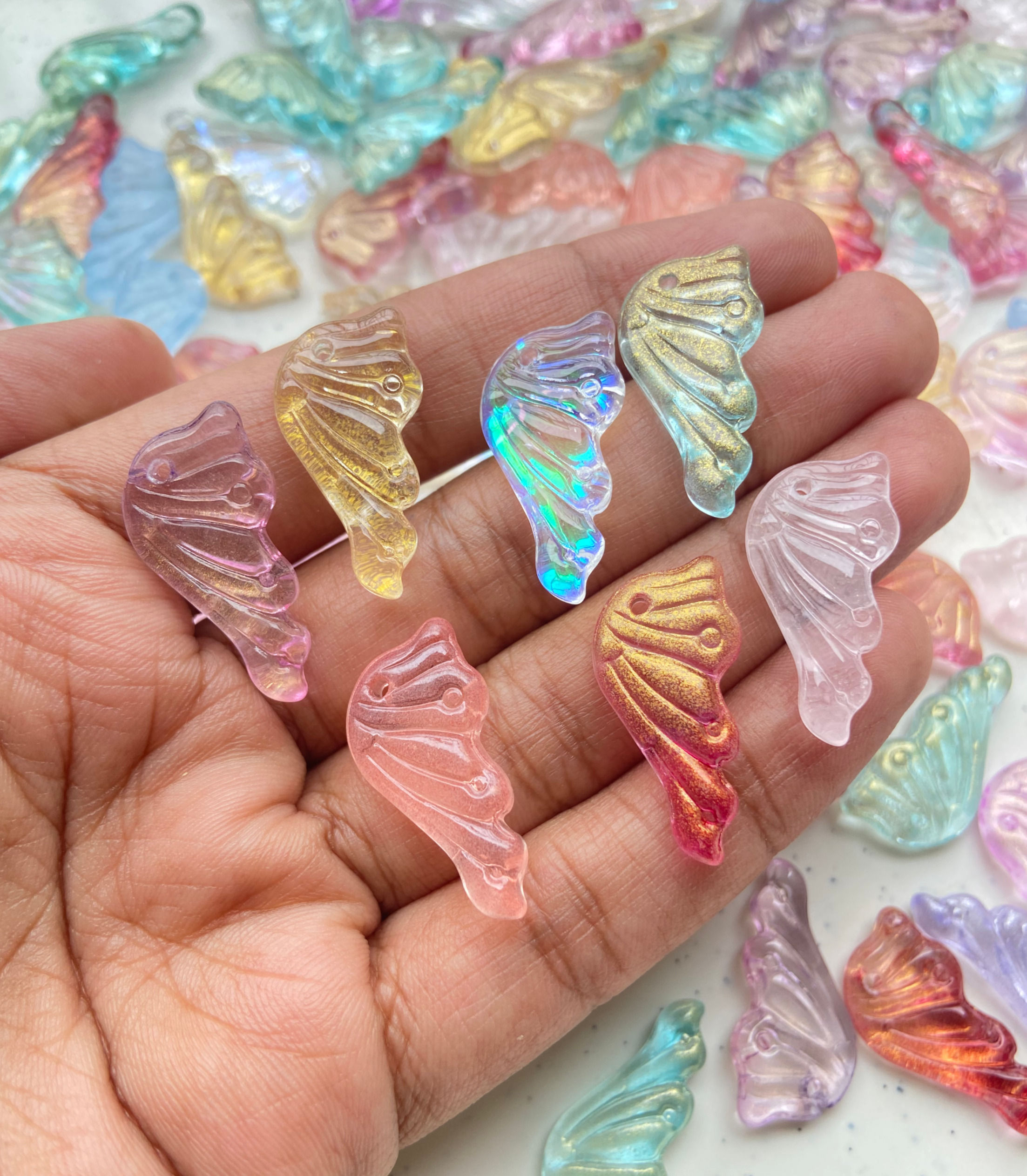 Iridescent acrylic wing charm