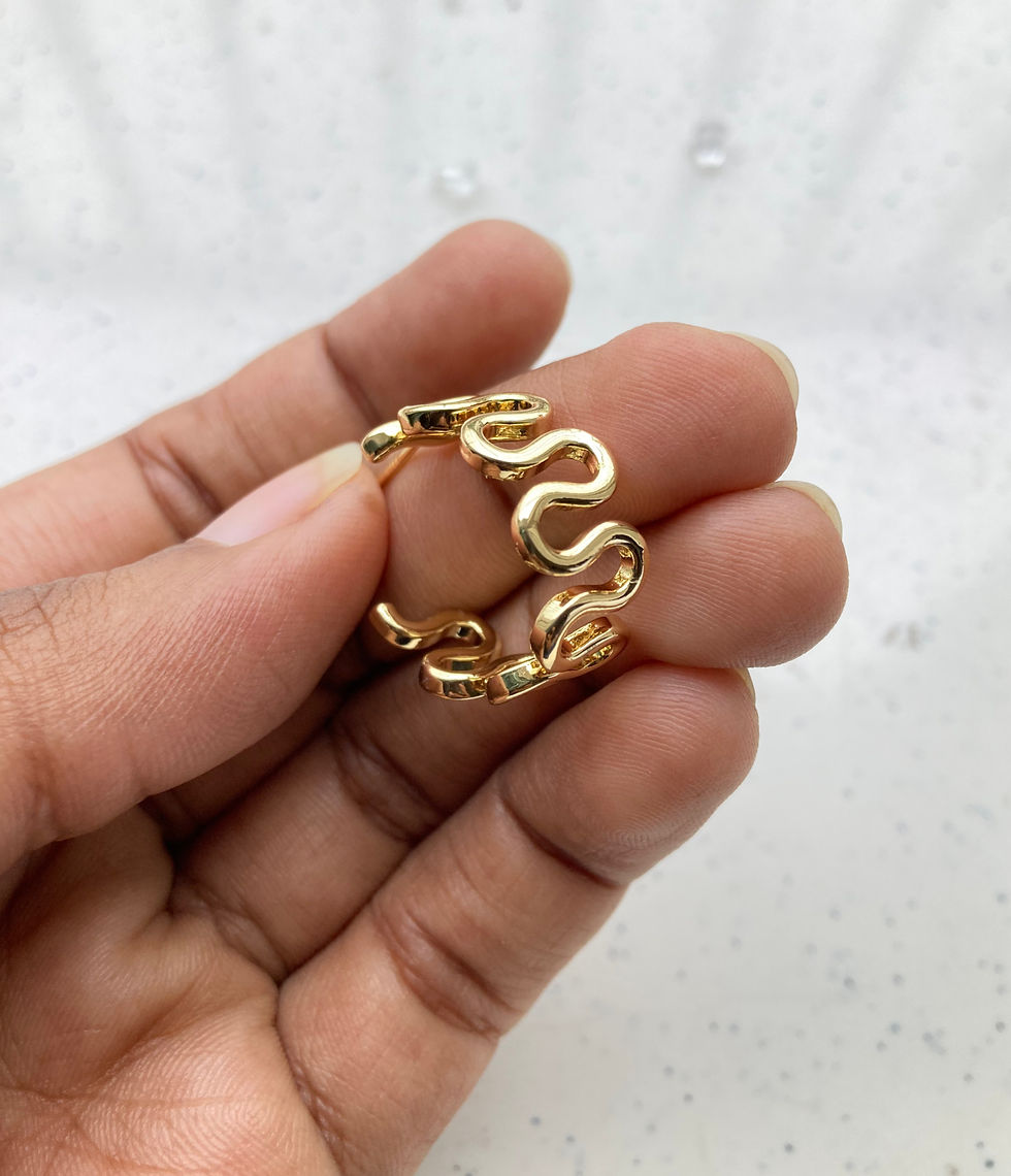 Thumbnail: Readymade swirl hoop earring
