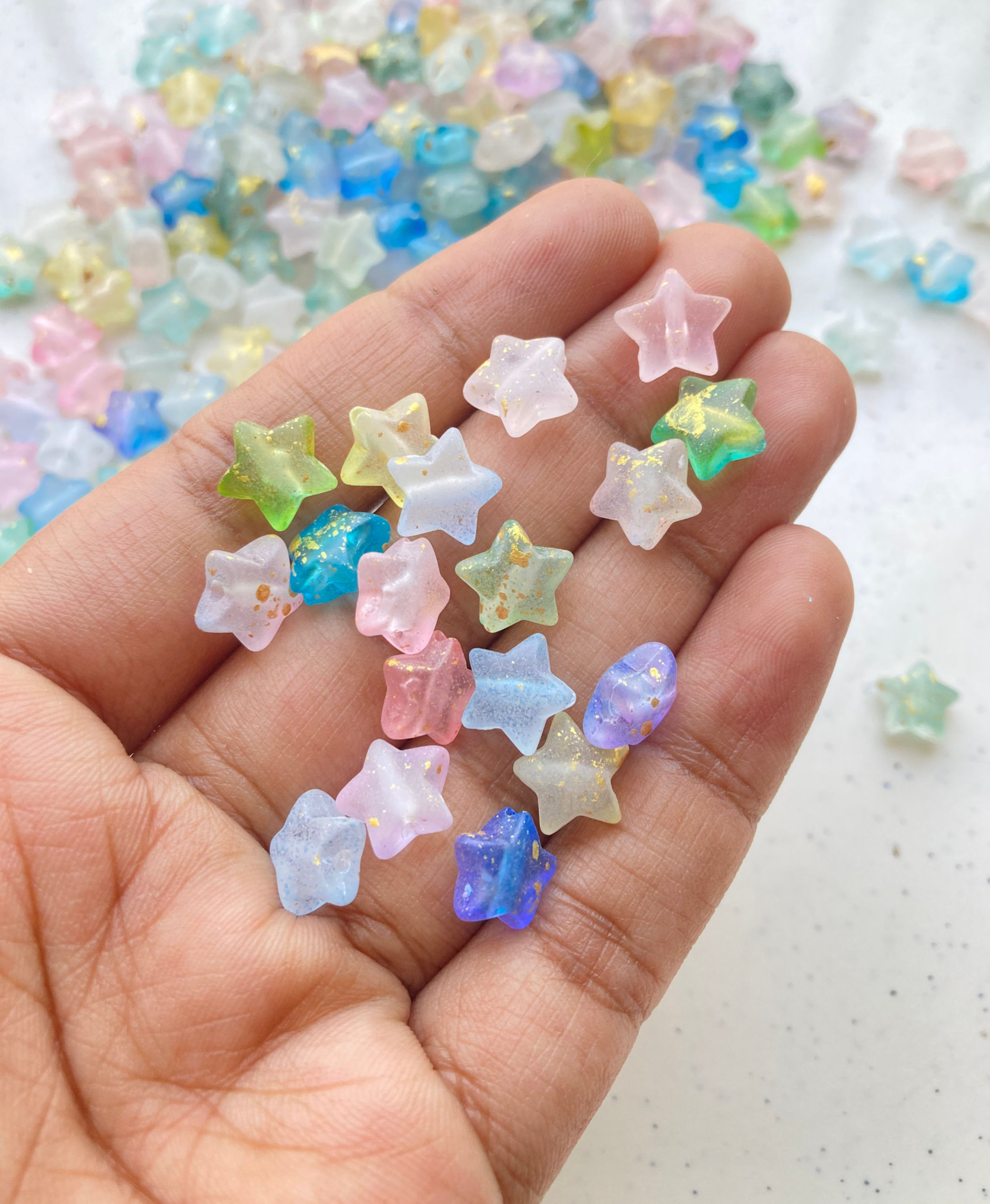 Gold foil frosted star bead