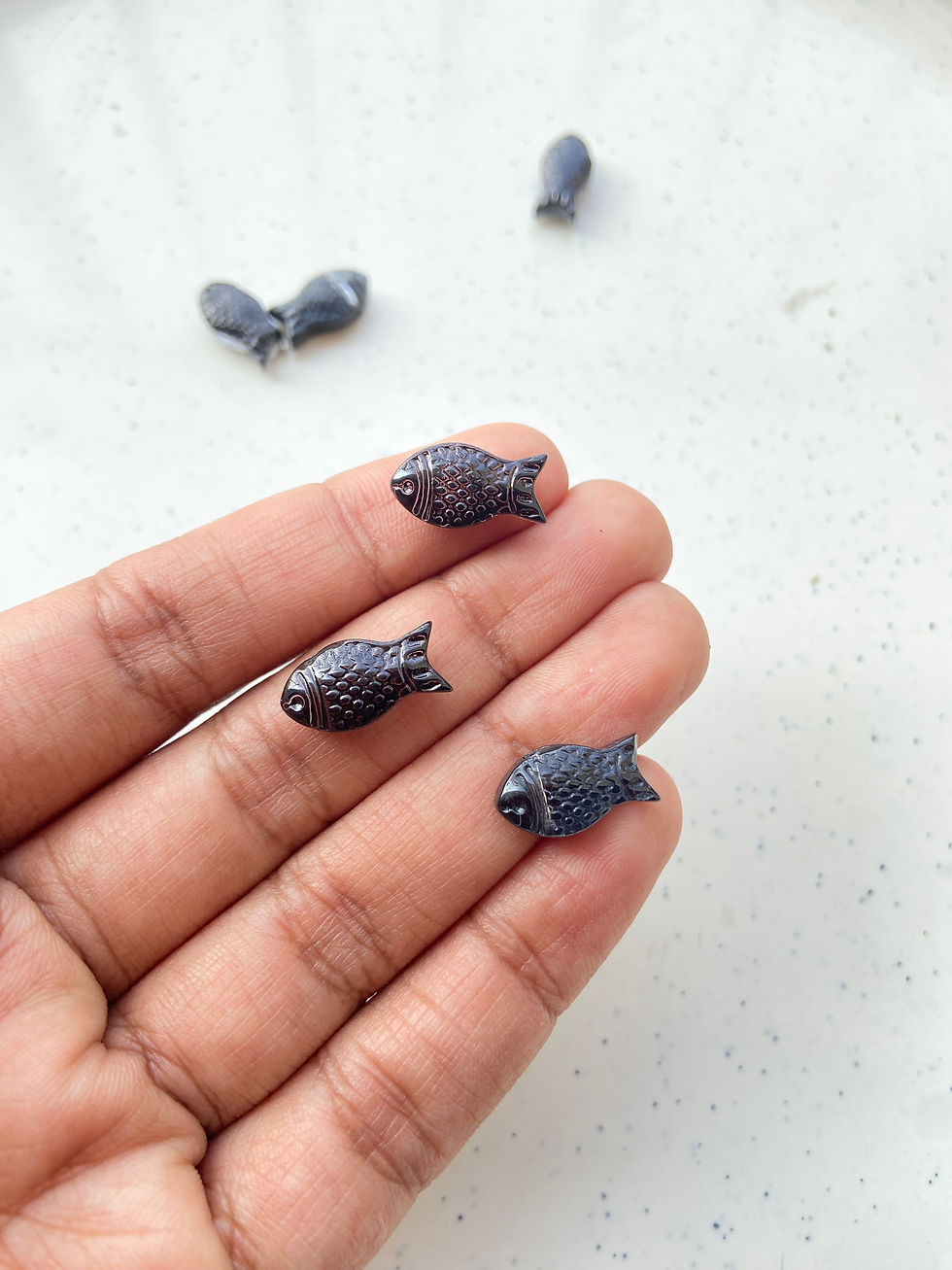 Thumbnail: Iridescent glass fish bead, side drilled