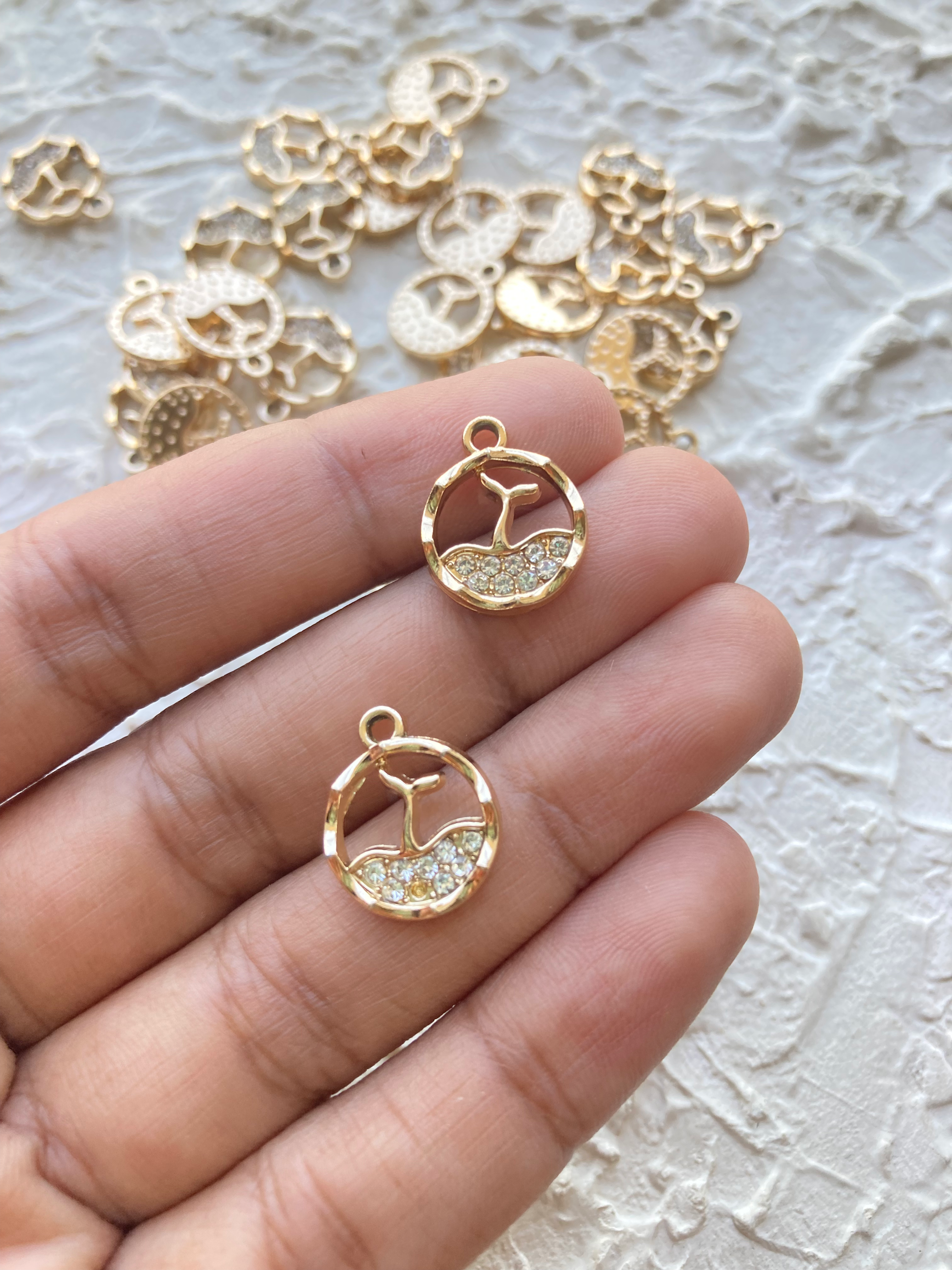 Alloy rhinestone circle with whale tail charm