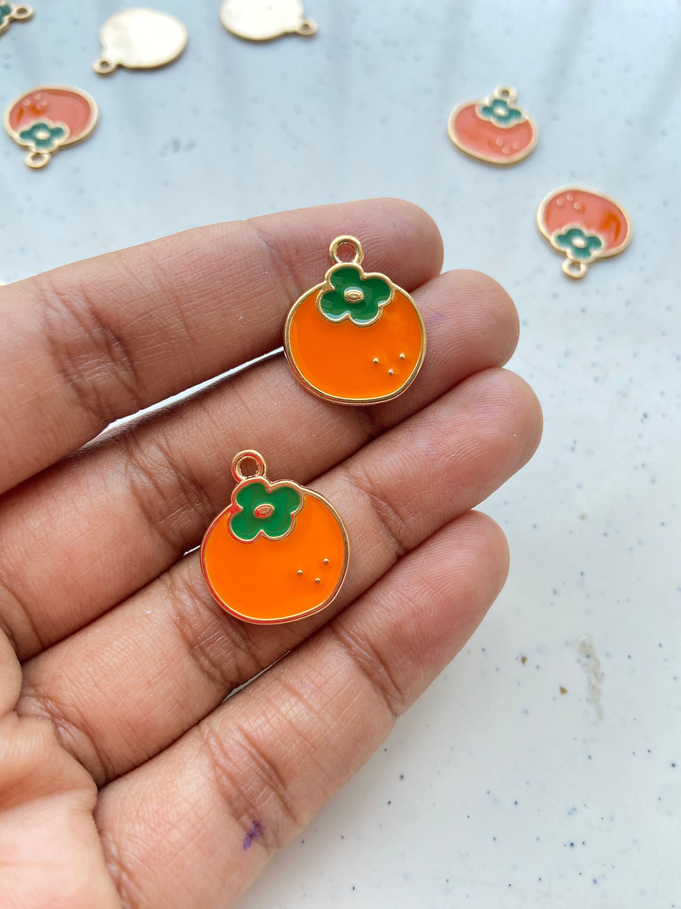 Thumbnail: Enamel orange alloy charm
