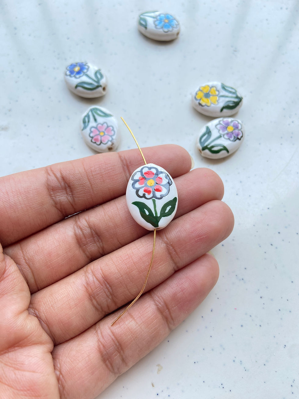 Thumbnail: Oval shape with flower print porcelain bead, vertically drilled (1pc)