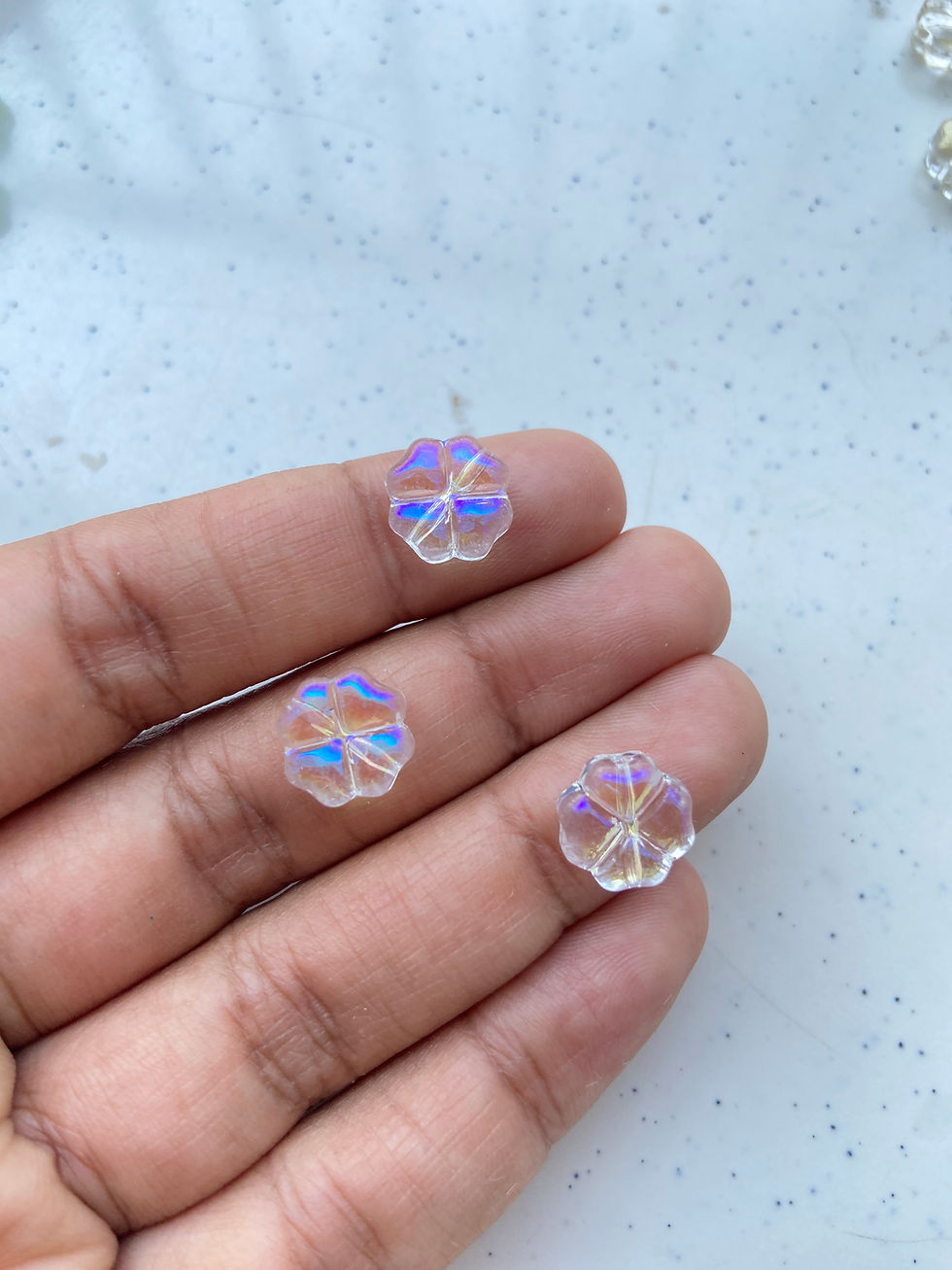 Thumbnail: Glass clover beads, vertically drilled