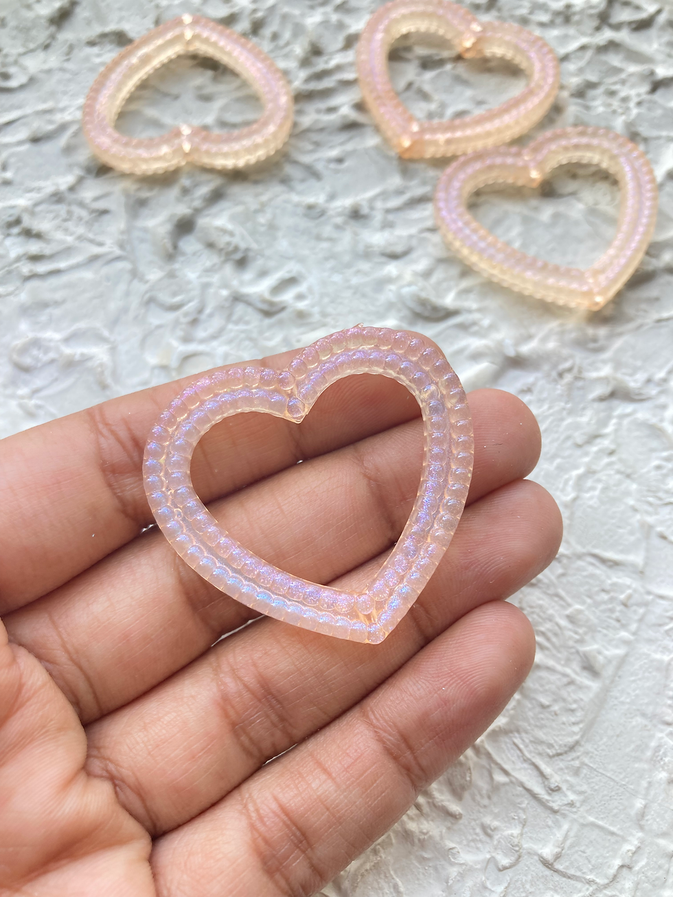 Thumbnail: Glow in dark acrylic heart frame bead