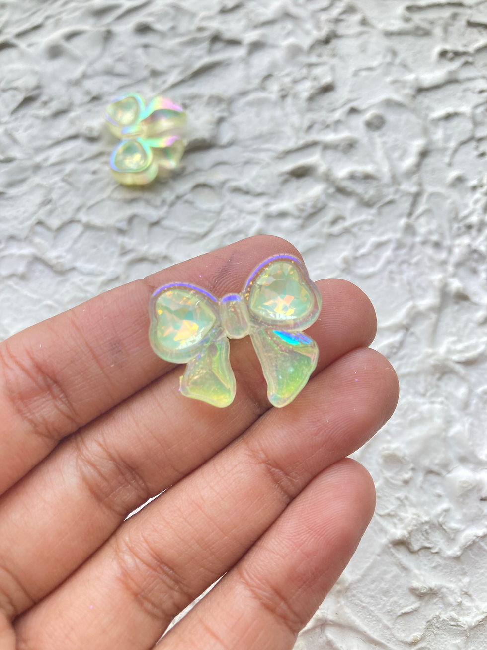 Thumbnail: Rhiestone glow in dark acrylic & glittering bow bead