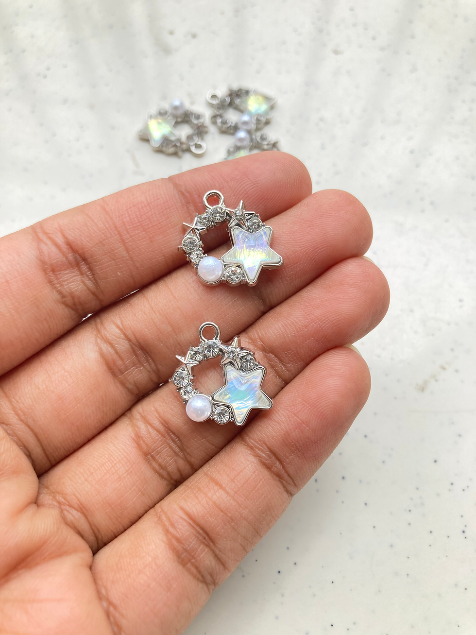 Thumbnail: Silver circle with stone and star charm