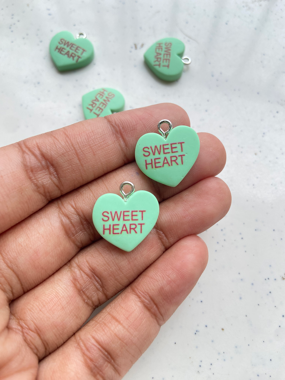 Thumbnail: Solid colour resin heart charm with platinum plated iron loop