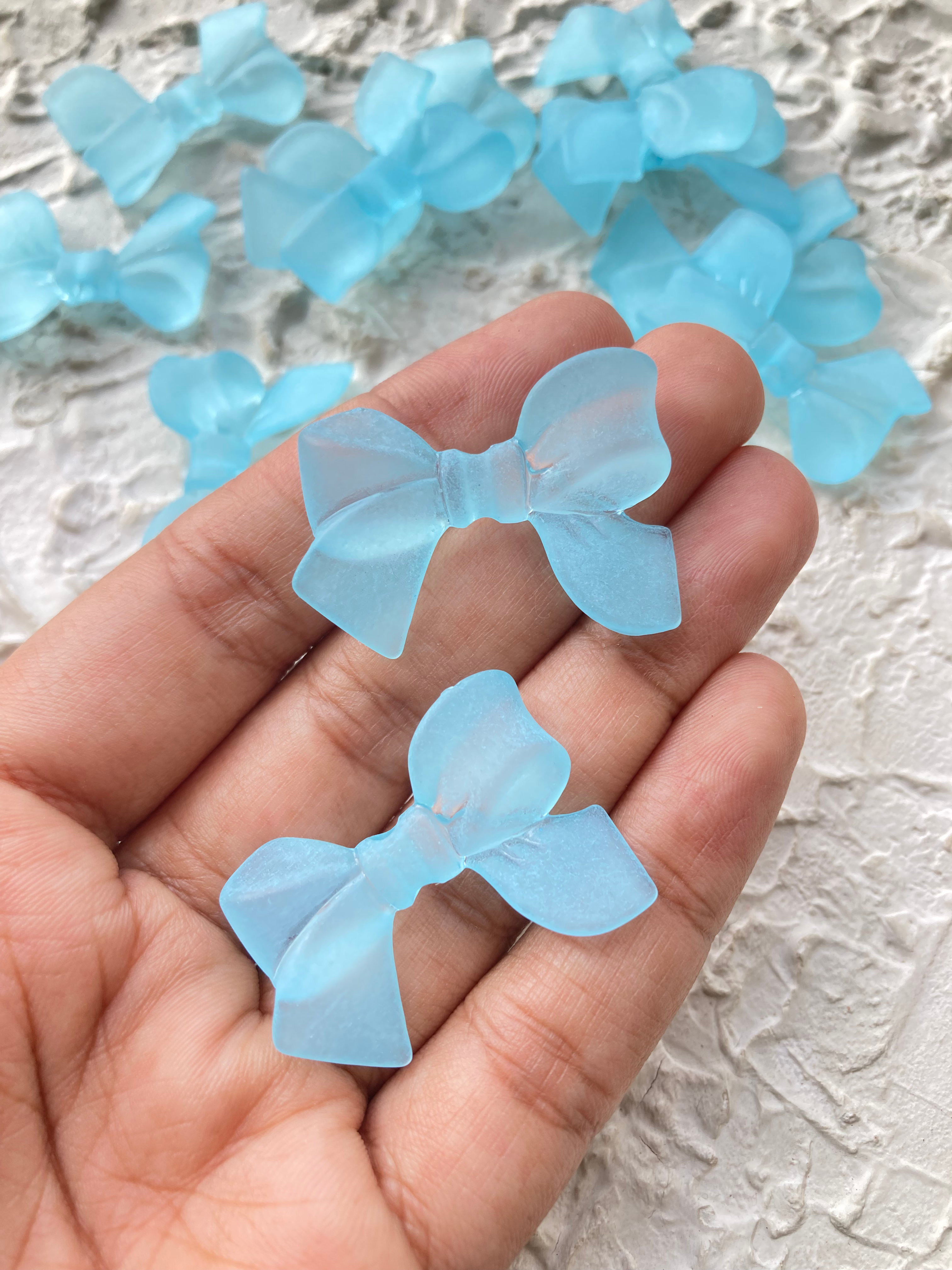 Frosted acrylic bow bead