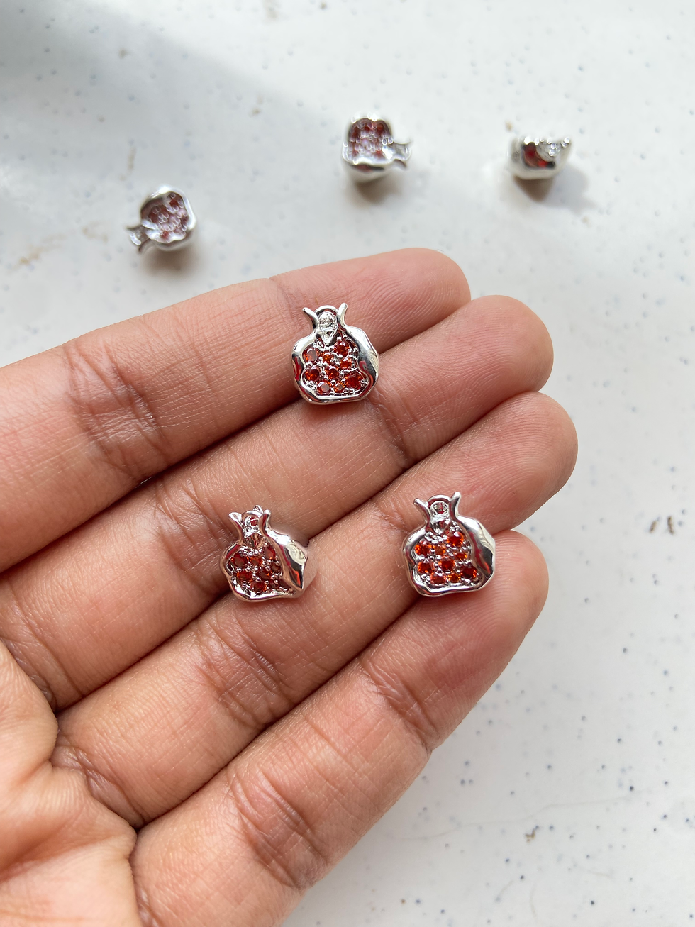 Thumbnail: Pomegranate zircon charm