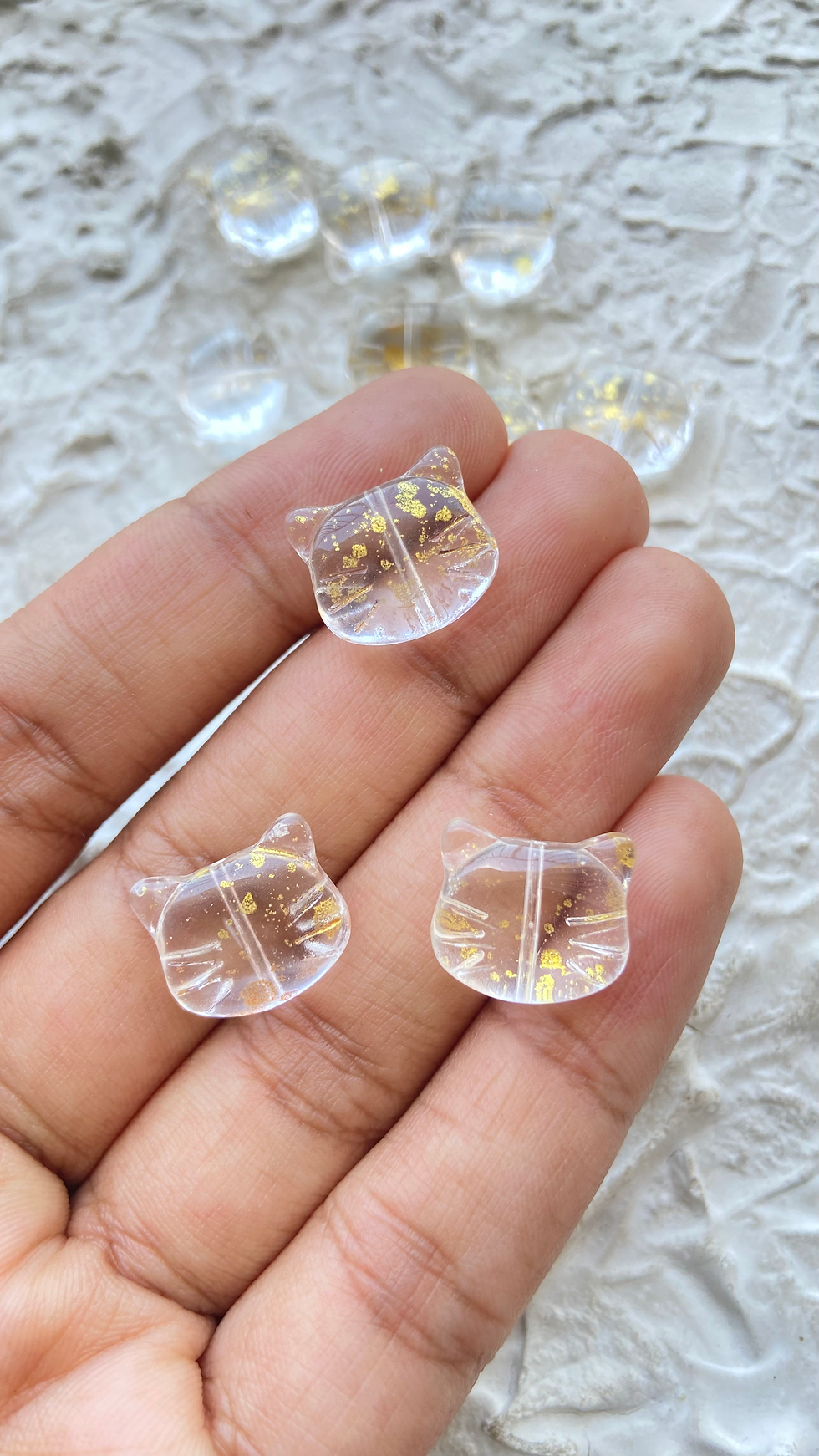 Thumbnail: Transparent colourful lampwork cat bead vertically drilled