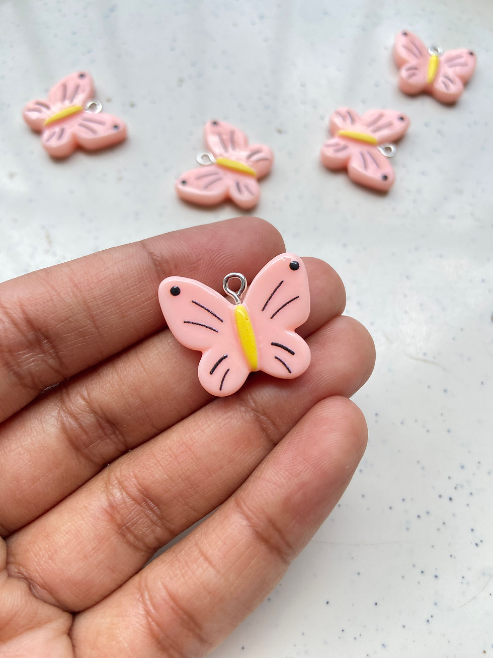 Thumbnail: Colourful resin butterfly charm
