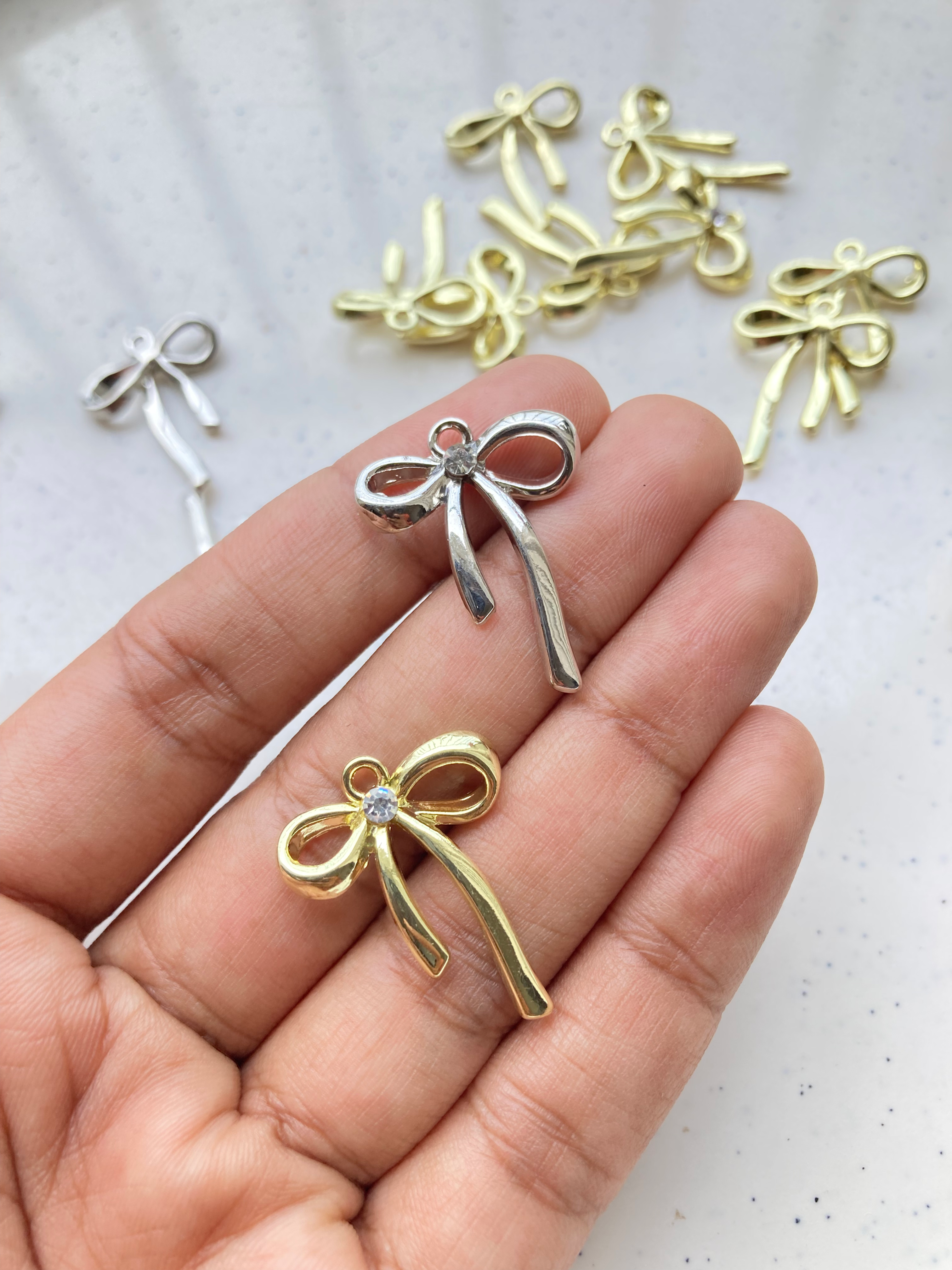 Bow knot with rhinestone charm