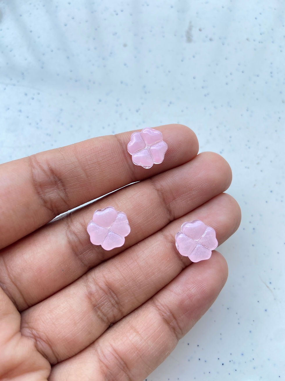 Thumbnail: Glass clover beads, vertically drilled