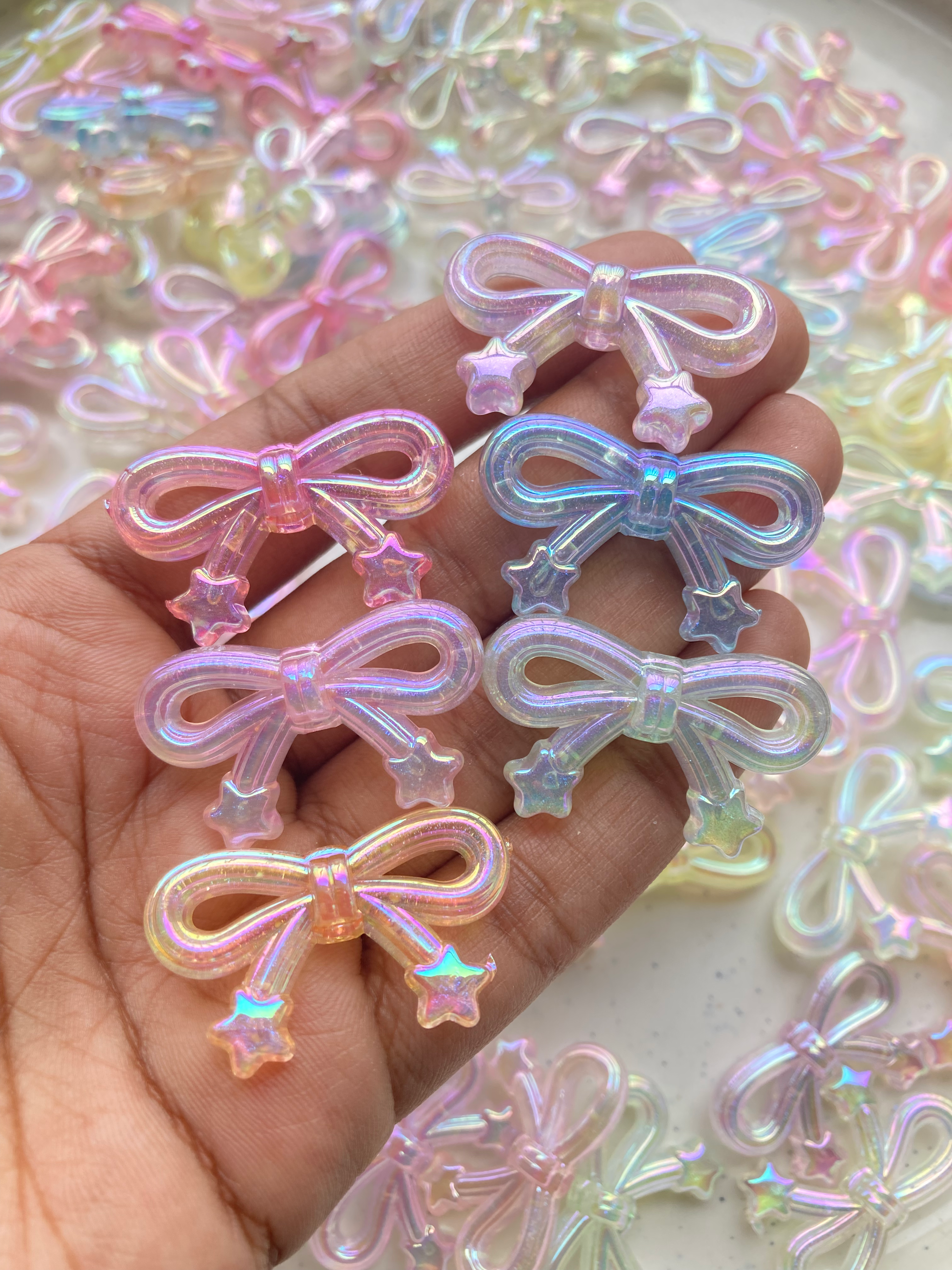 Shiny bow with star acrylic bead, vertically drilled