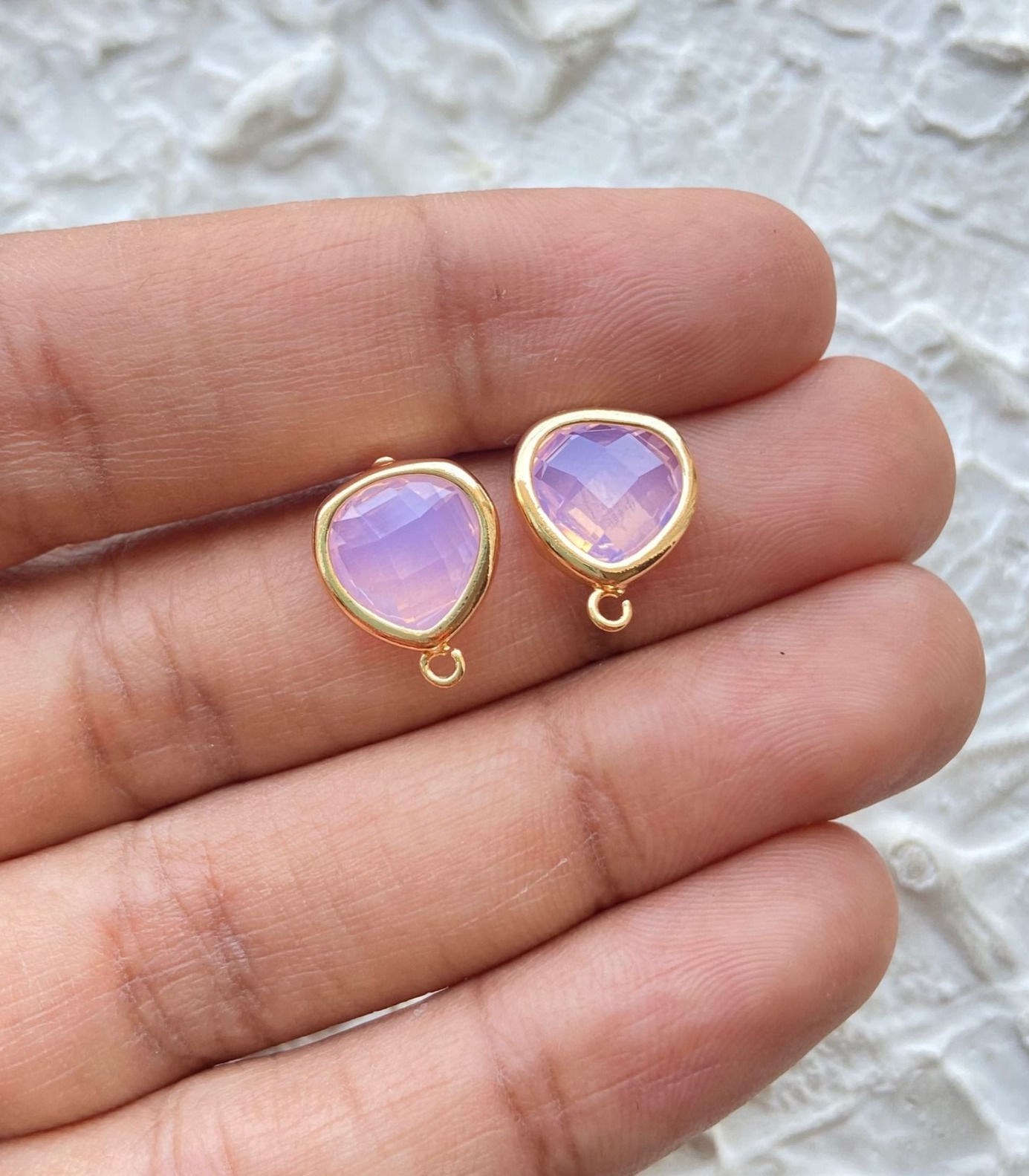 Pink glass curved traingle shape stud