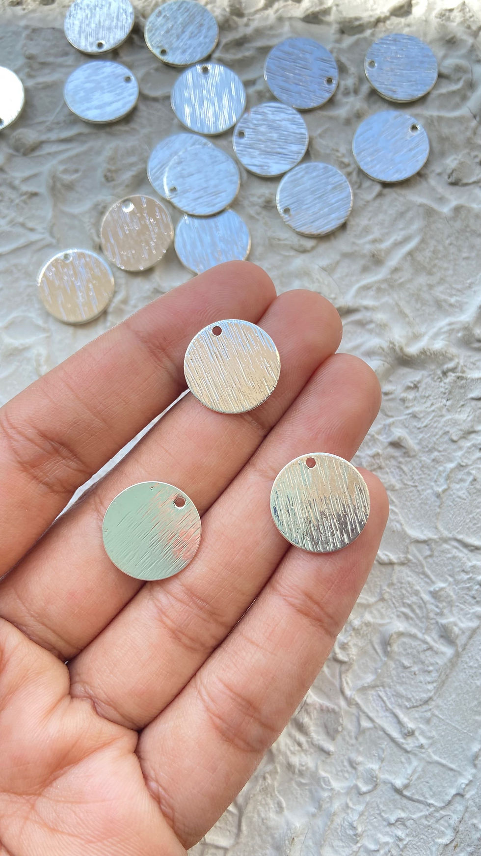 Thumbnail: Silver plated textured coin charm