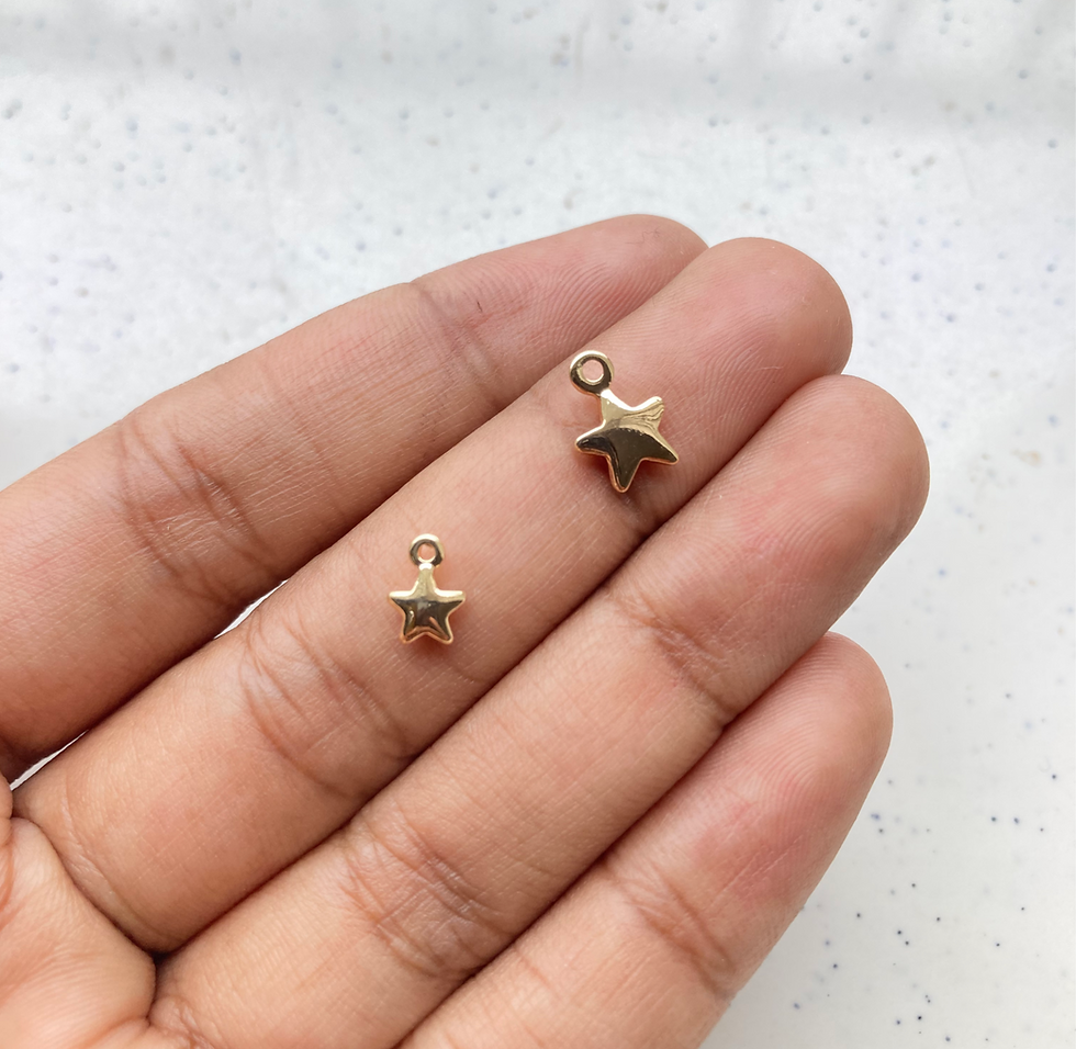 Thumbnail: 18k gold plated tiny star charm