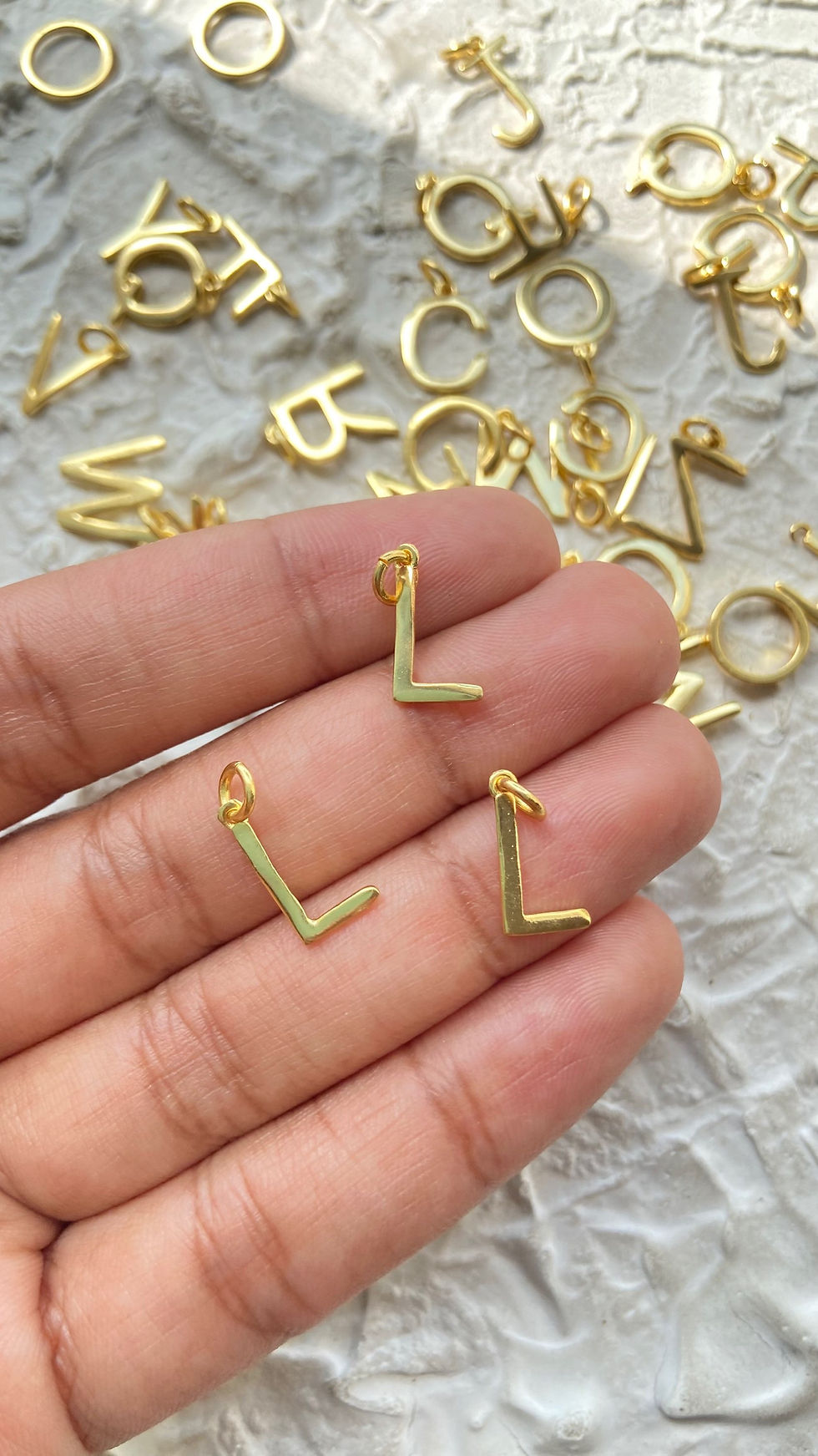Thumbnail: Alphabet charms B to M