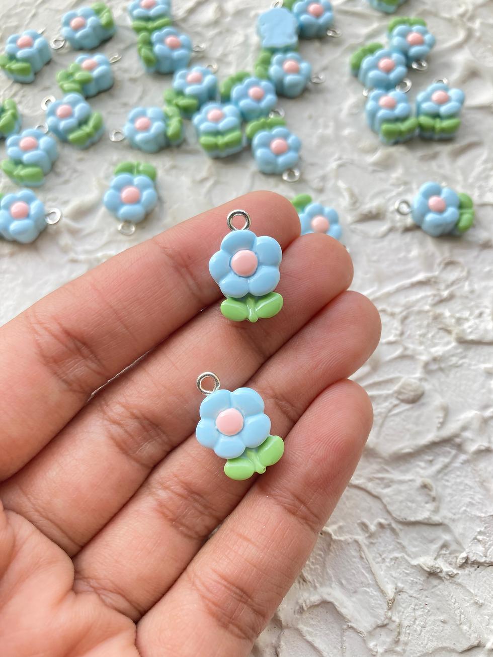 Thumbnail: Resin pastel flower with leaf charm
