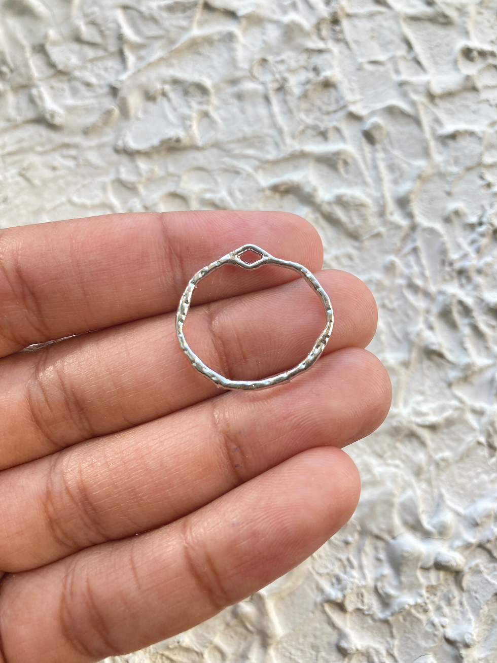 Thumbnail: Irregular circle alloy platinum colour bezel