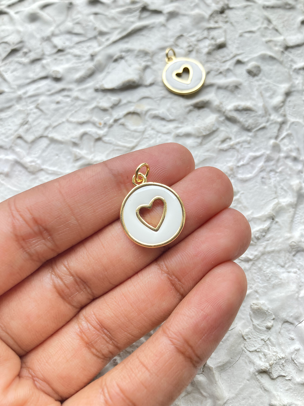 Thumbnail: Colourful enamel circle with hollow heart charm