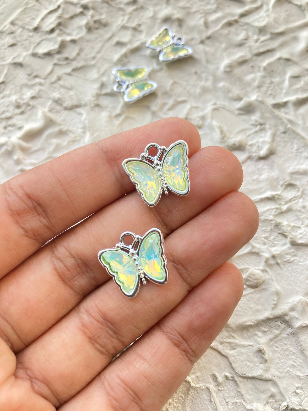 Thumbnail: Silver alloy butterfly glass charm