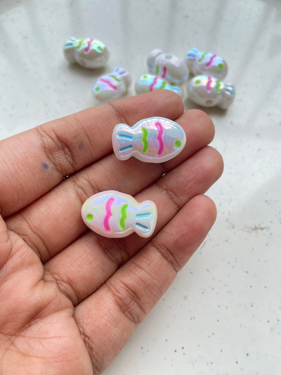 Thumbnail: Shiny acrylic fish bead, side drilled