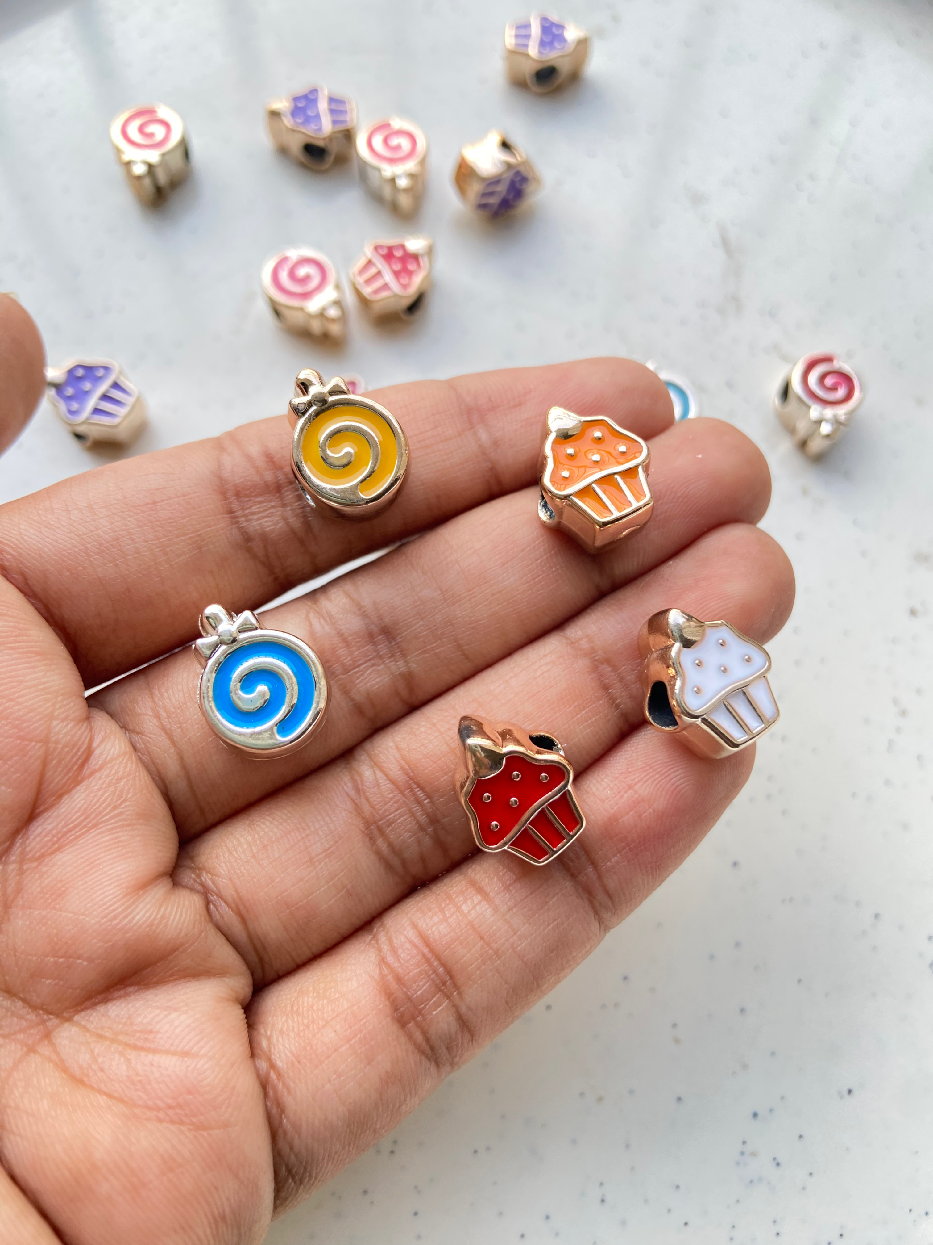 Cupcake/swiss roll acrylic enamel bead, side drilled