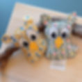 Doudou hibou des motifs triangles jaunes ou verts, fait mains en France Ardèche