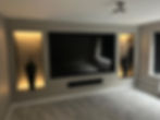 Modern media wall with bespoke carpentry and joinery.