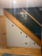Bespoke carpentry and joinery under-stairs storage cabinets