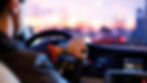 Someone Driving a car at sunset