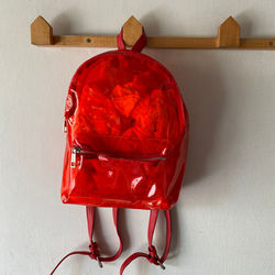 mochila mini roja transparente