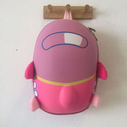 mochila niño avion rosa