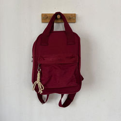 mochila bordo charm