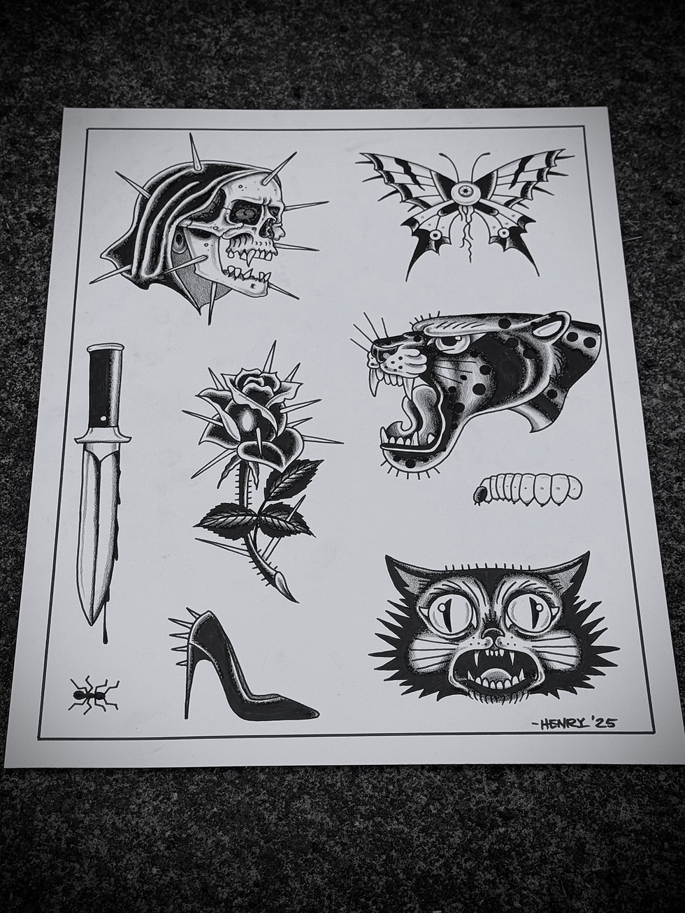 Oddball Tattoo flash sheet with black ink designs: skull with spikes, butterfly, roaring panther, knife, rose, high heel, cat face, signed Henry '25.