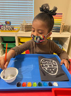 Little girl painting