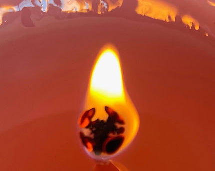 An image of a candle flame.