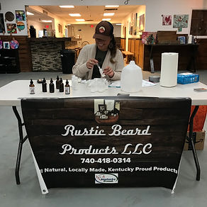 A local artisan making custom body care products during an in-store event at Silo Ridge Makers Market.