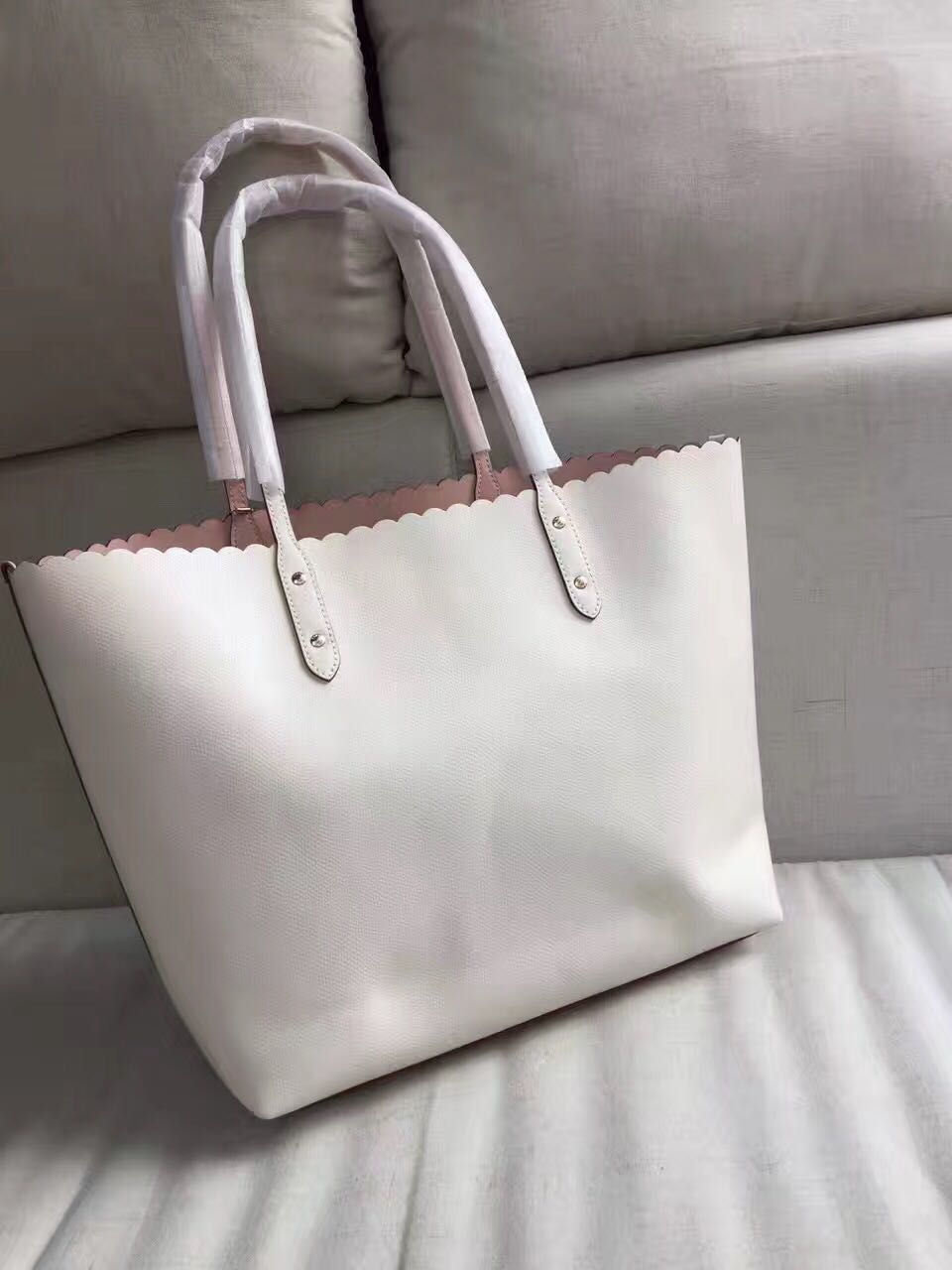 Thumbnail: COACH city tote in floral applique leather