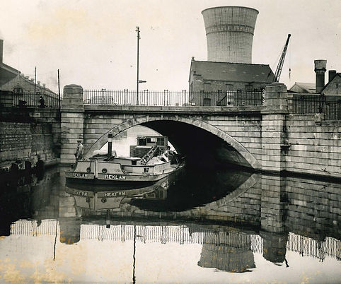 Bridge-on-Foss-with-barge-(colling-tower-in-distance).jpg