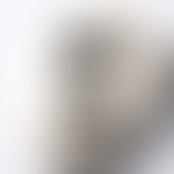 Softly lit close-up of a white bar of soap with water droplets, featuring the message “Stop using soap on your skin,” reflecting a skin barrier focused approach to cleansing